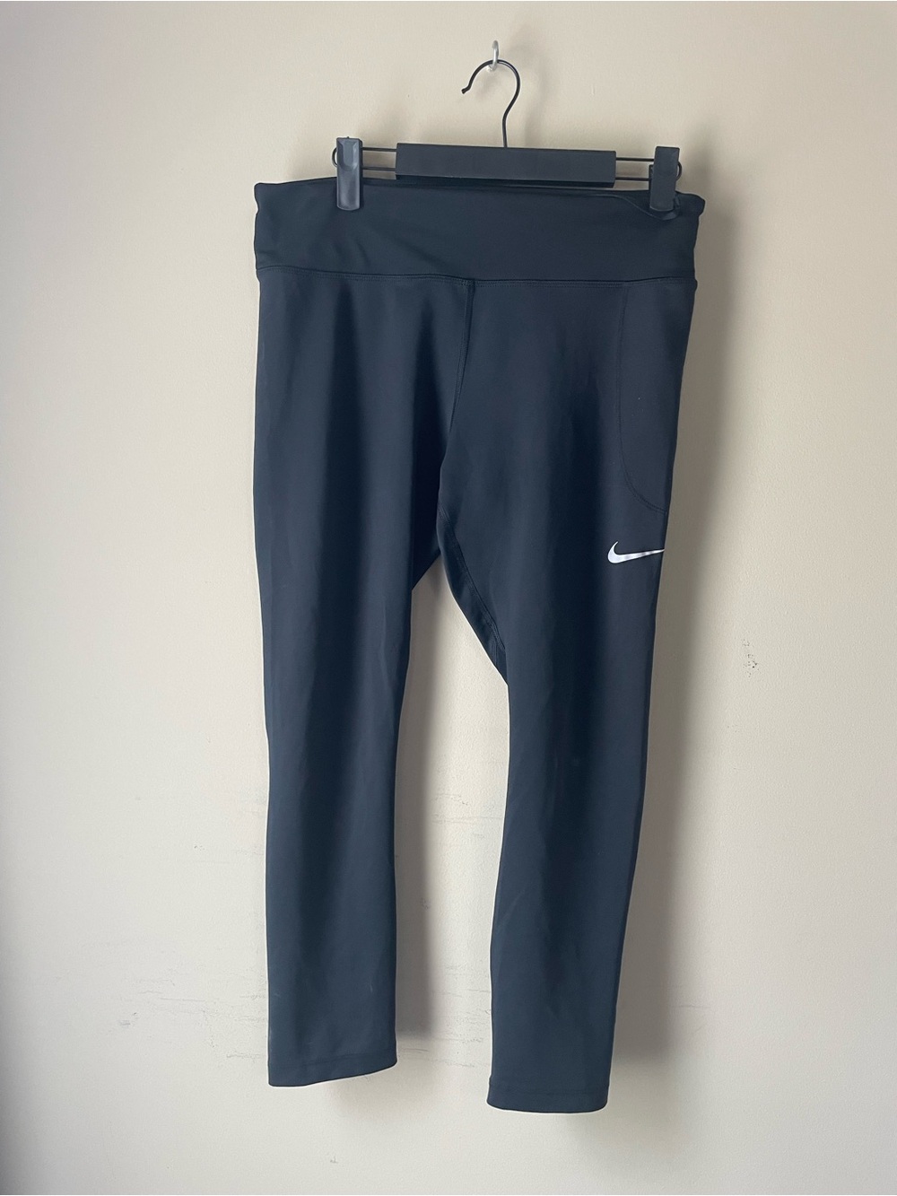 Nike Black woman’s Athletic Leggings with White Swoosh